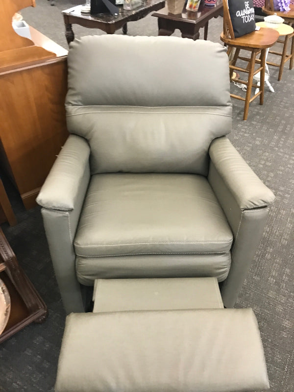 GREY FAUX LEATHER SWIVEL RECLINER CHAIR.
