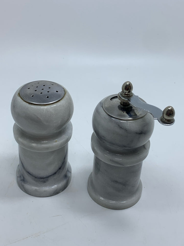 WHITE MARBLE SALT SHAKER AND PEPPER GRINDER.
