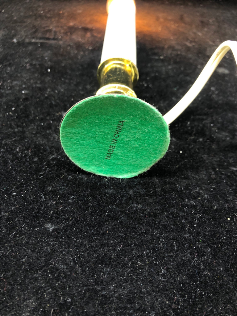 WHITE PLUG IN CANDLE LIGHT.
