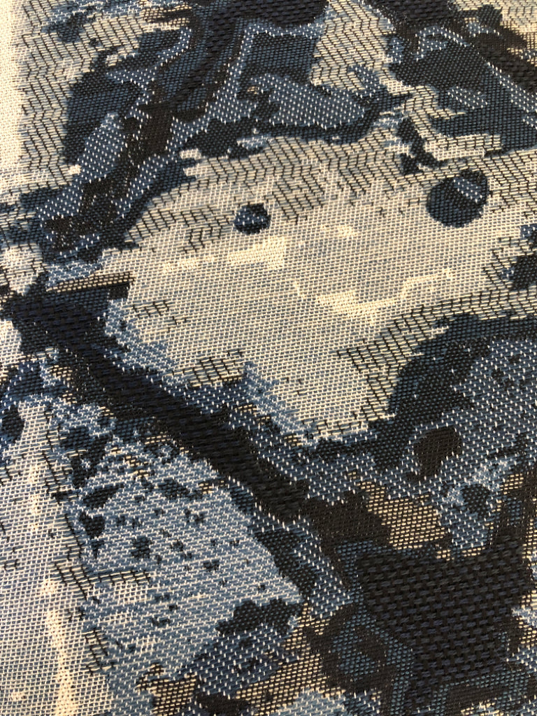 BLUE AND WHITE SQUARE PILLOW.