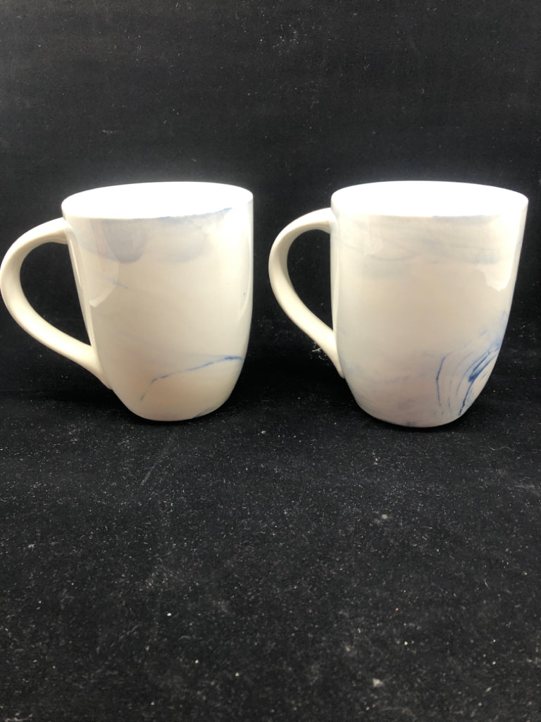 2 BLUE SWIRLED MUGS.