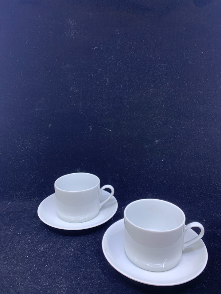 2 WHITE TEACUP AND SAUCERS.
