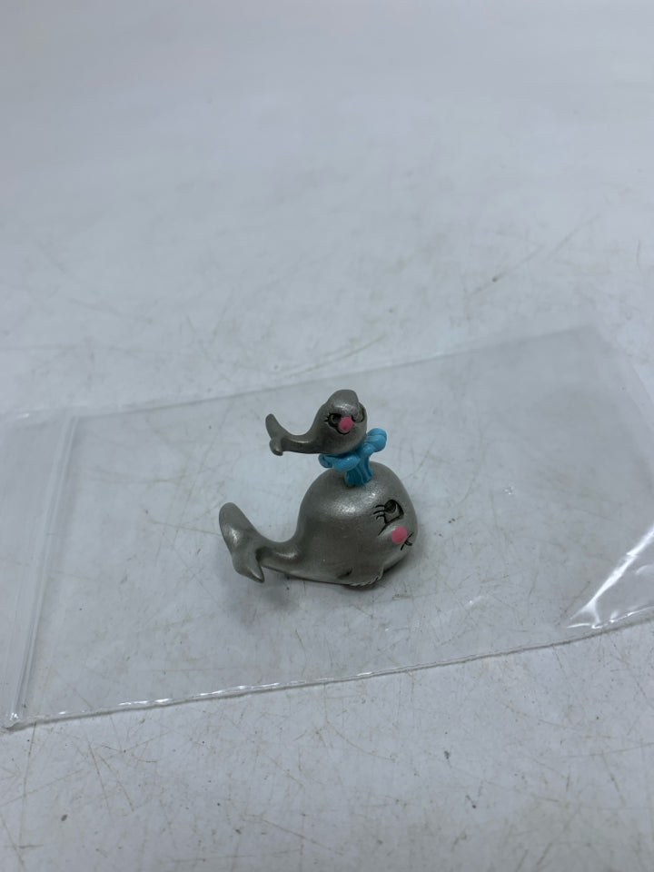 MINI WHALE FIGURINE.