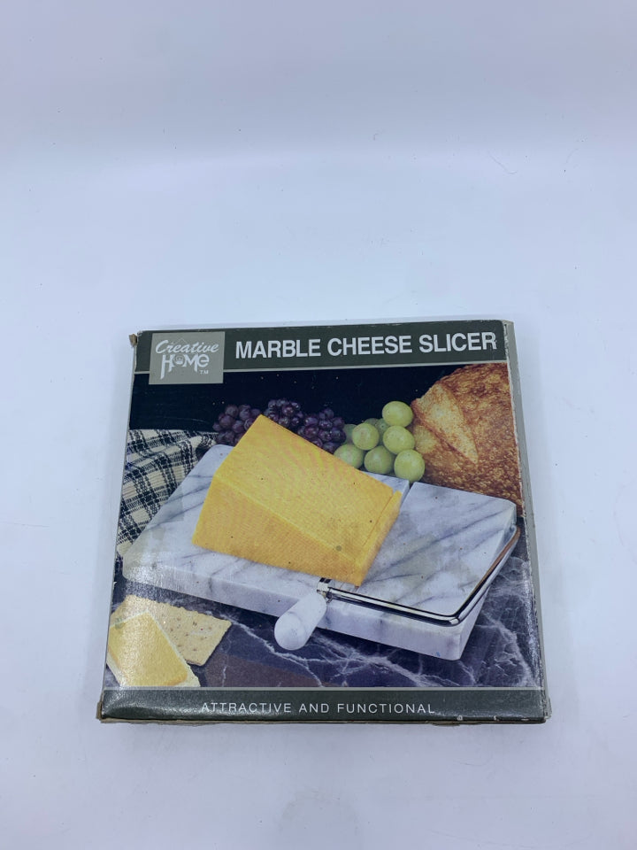 NIB MARBLE CHEESE SLICER.