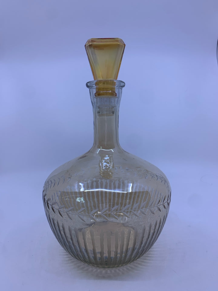 AMBER GLASS ETCHED DECANTER.