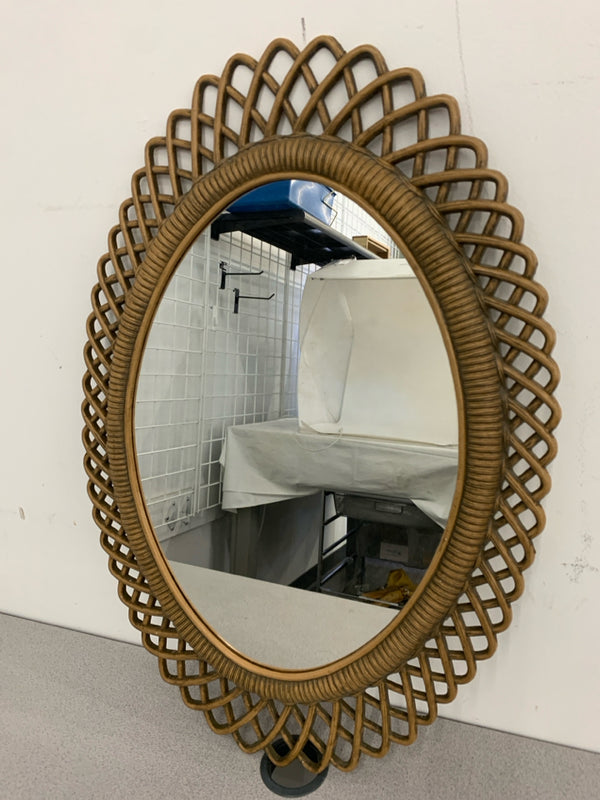SQUIGGLY BROWN OVAL MIRROR.