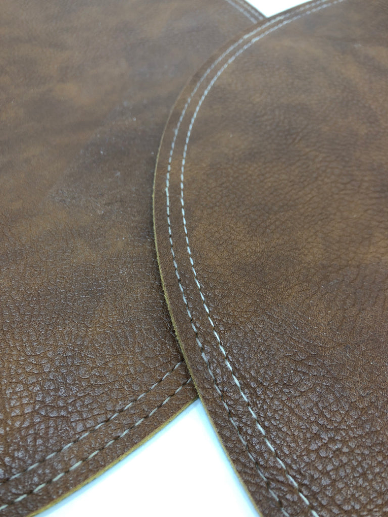 2 FAUX LEATHER ROUND REVERSIBLE PLACEMATS.