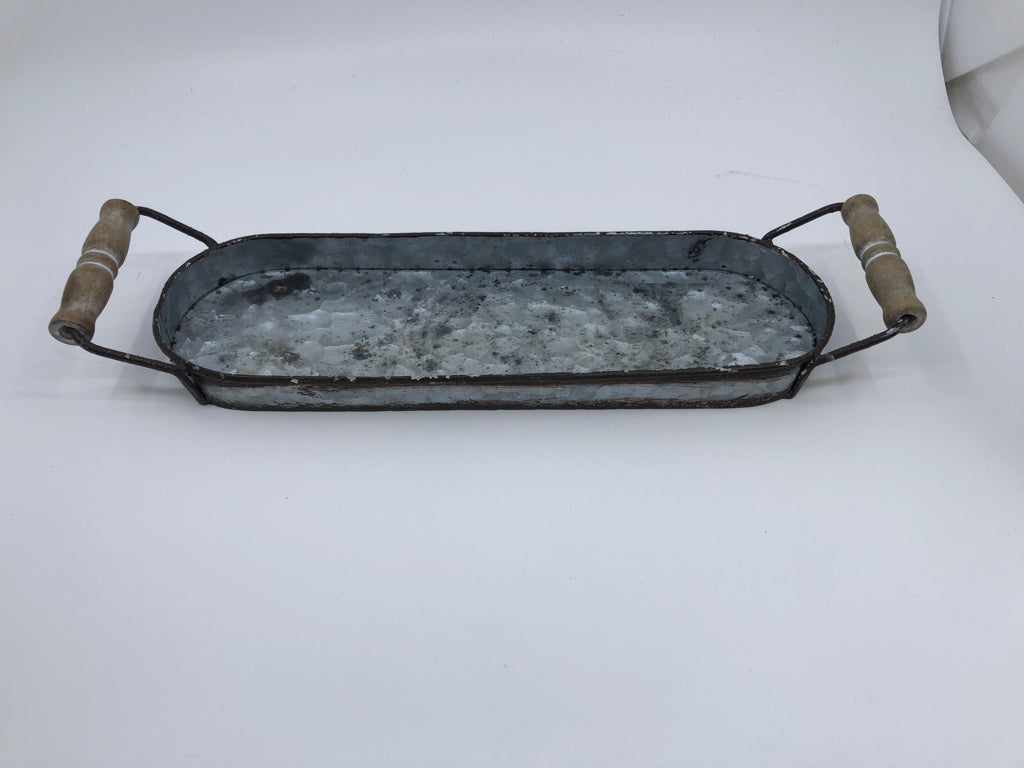 OVAL GALVANIZED METAL TRAY W WOOD HANDLE.