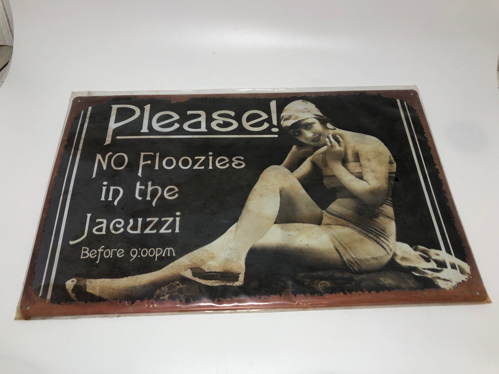 NIP NO FLOOZIES METAL SIGN.