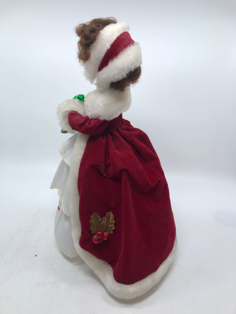 MUSICAL SPINNING DOLL LADY IN CLOAK.