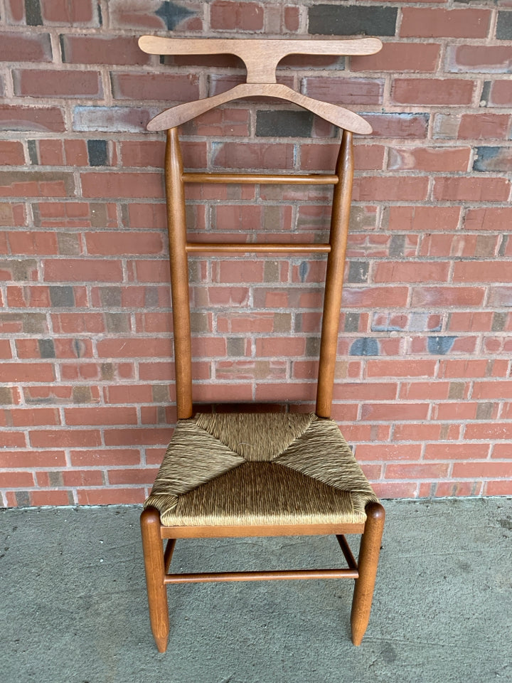 VTG TALL BACK BUTLERS CHAIR W/CANE SEAT.