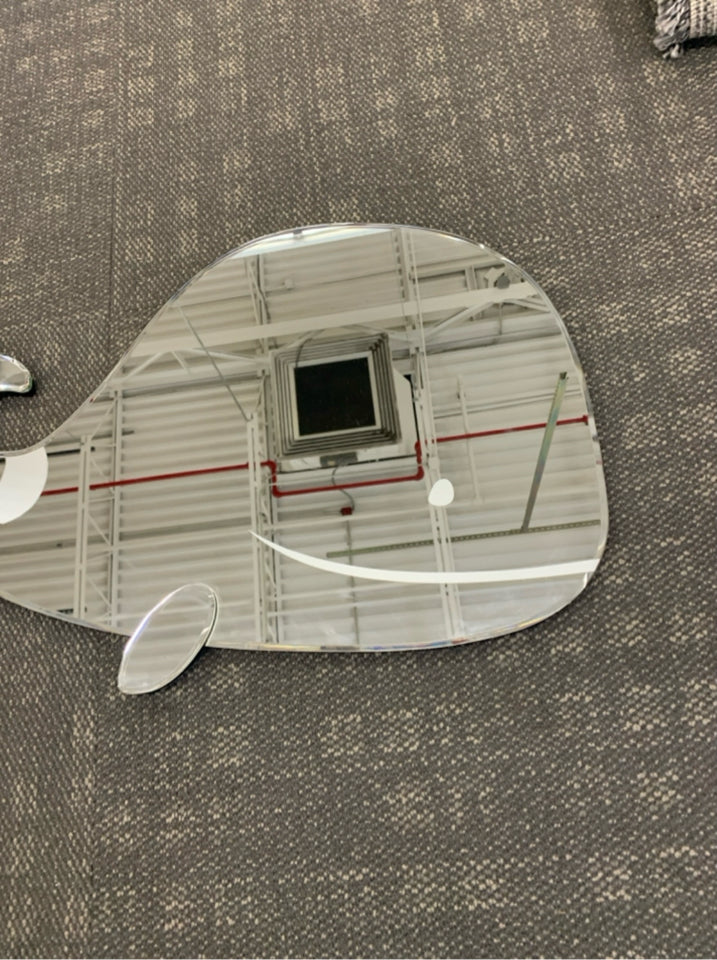 LARGE WHALE SHAPED MIRROR.