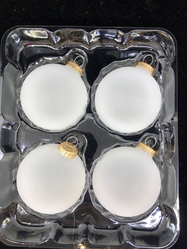 4 NIB GLASS ORNAMENTS.
