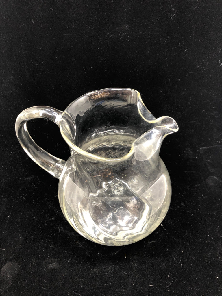 CLEAR SWIRL GLASS WITH ICE LIP.