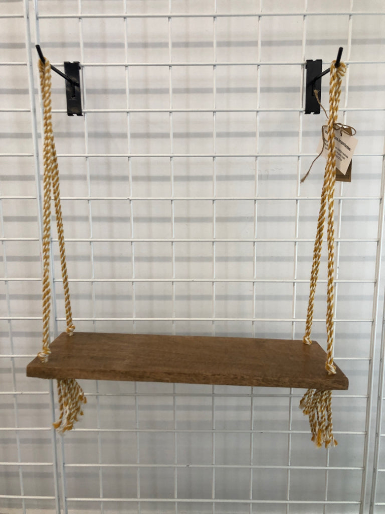 NWT HANGING WOOD SHELF W/YELLOW BRAIDED STRING.