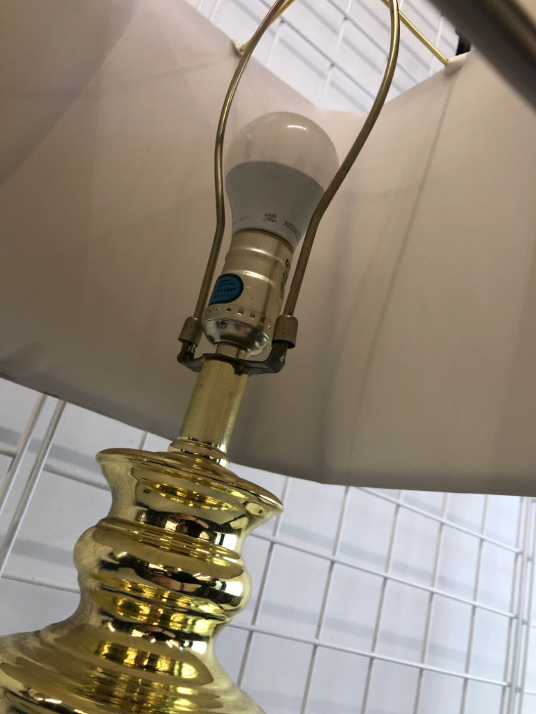 GOLD BASE LAMP W/TAN SHADE.
