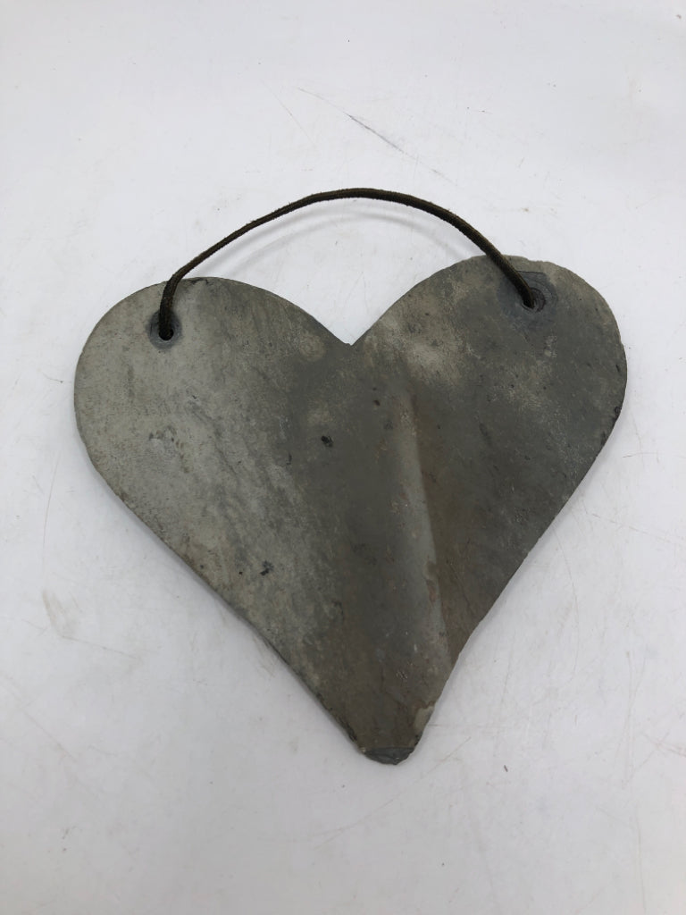 HEART SHAPED STONE SLAB HANGING.