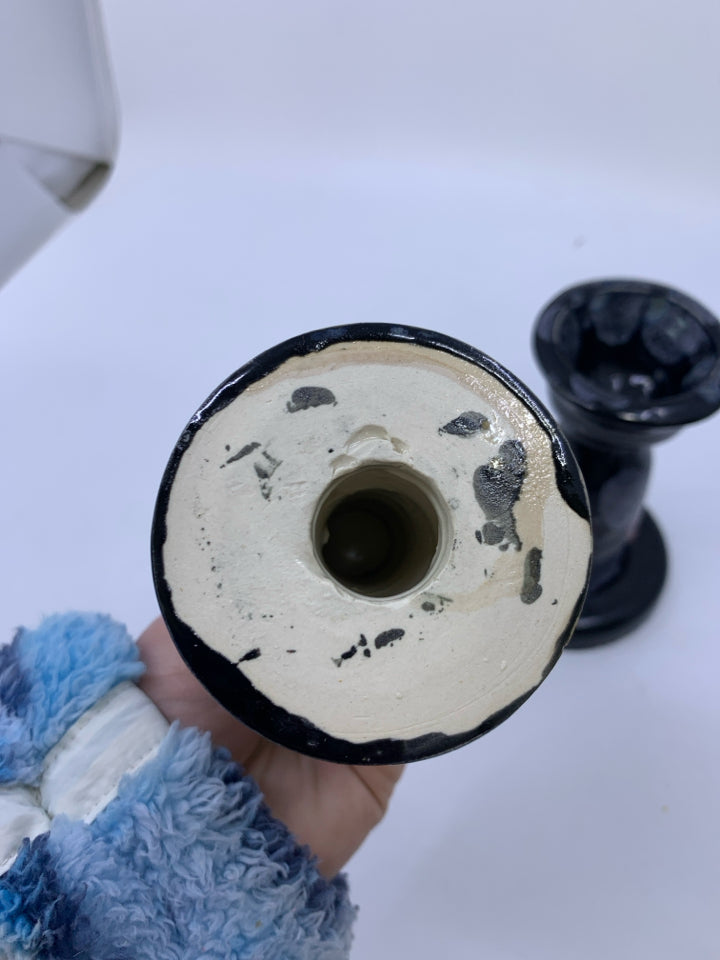 2PC POTTERY CANDLE HOLDER SET.