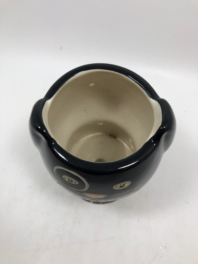 CERAMIC GREEN STRIPE BLACK DOG PLANTER.