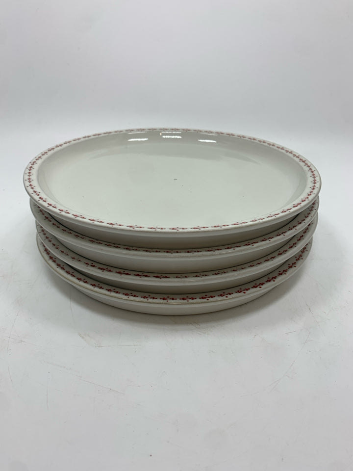 4 WHITE STONEWARE PLATES W/RED DOTTED RIM.