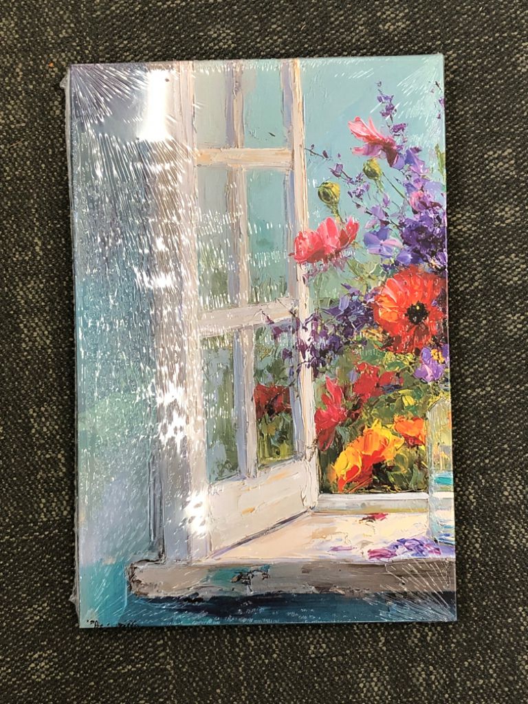 NIP FLOWERS BY OPEN WHITE DOOR CANVAS PRINT.