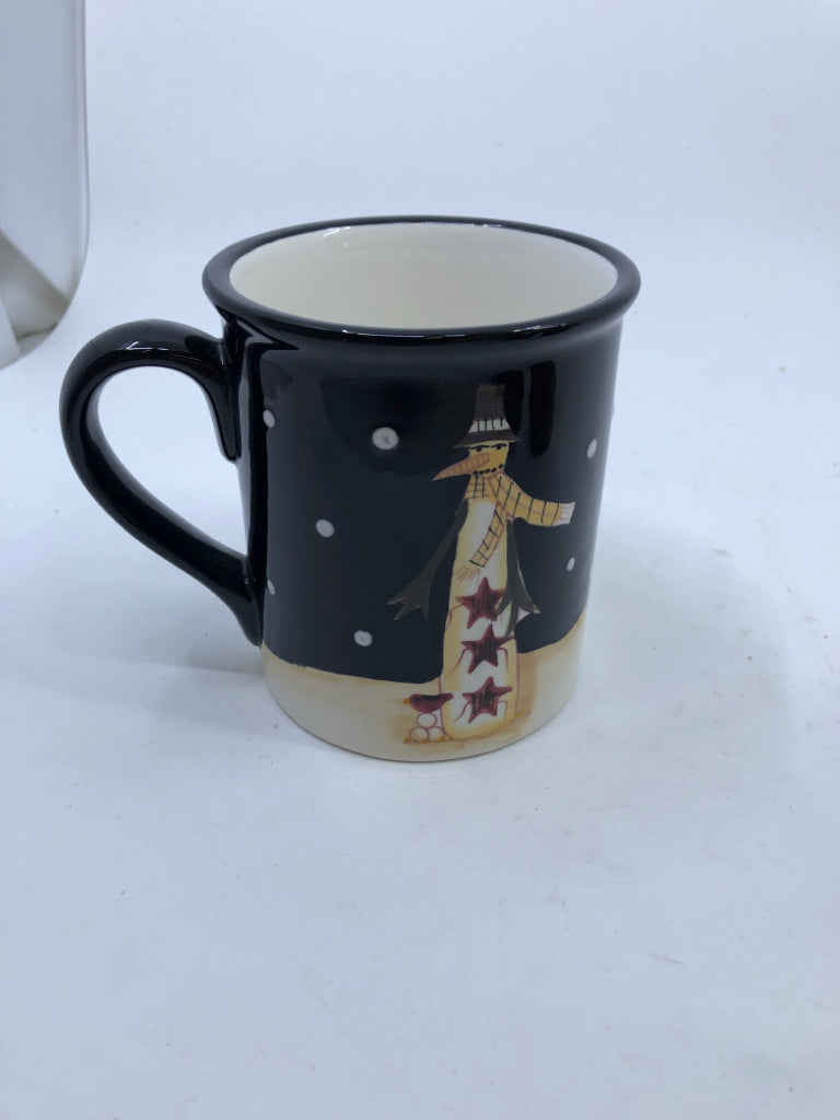 BLACK PRIMITIVE SNOWMAN MUG.