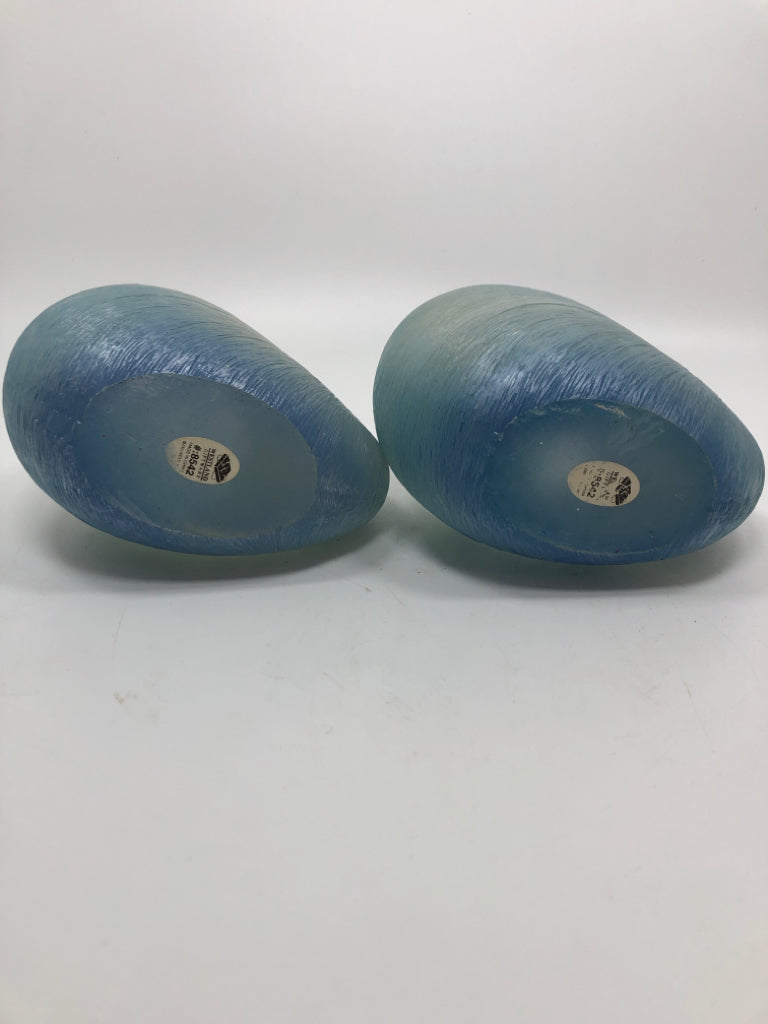2 BLUE GLASS SEASHELL VOTIVE HOLDERS.