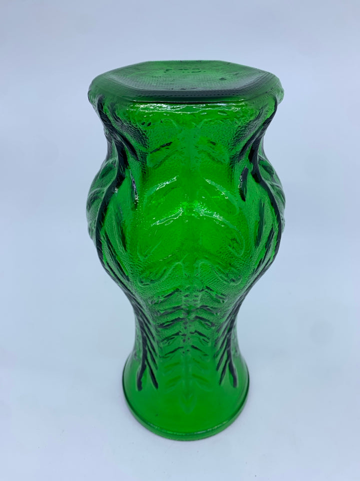 VTG GREEN GLASS FOOTED VASE W/ EMBOSSED LEAF PATTERN.