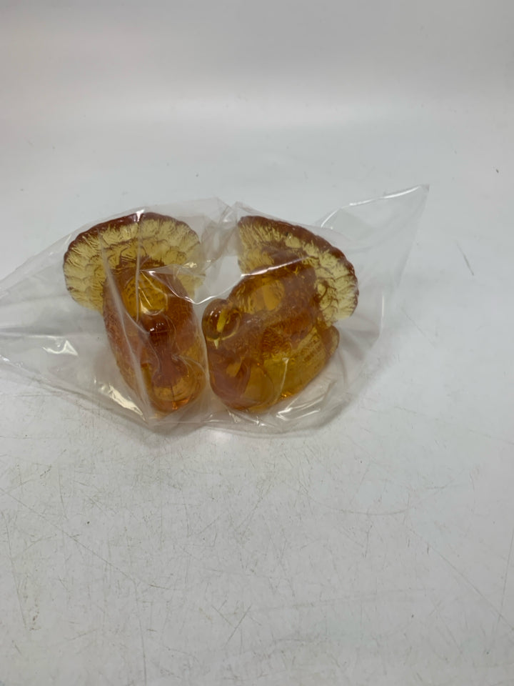 2 EMBER GLASS TAPERED CANDLE HOLDERS IN BAG.