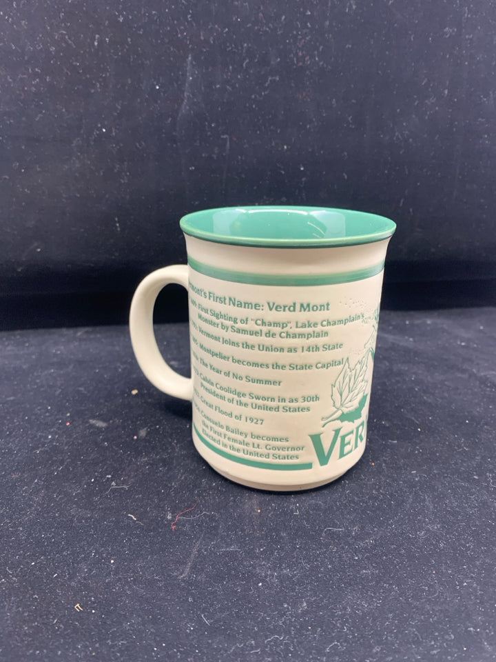 CREAM AND GREEN VERMONT FACTS MUG.