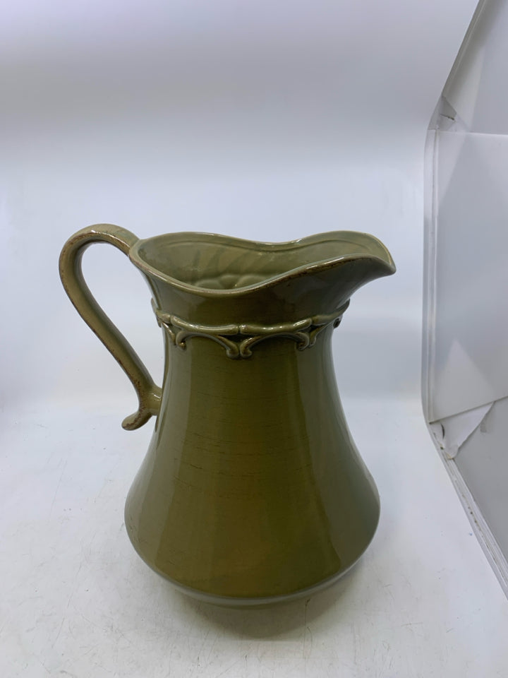 LARGE CERAMIC PITCHER W/ EMBOSSED DETAILED NECK.