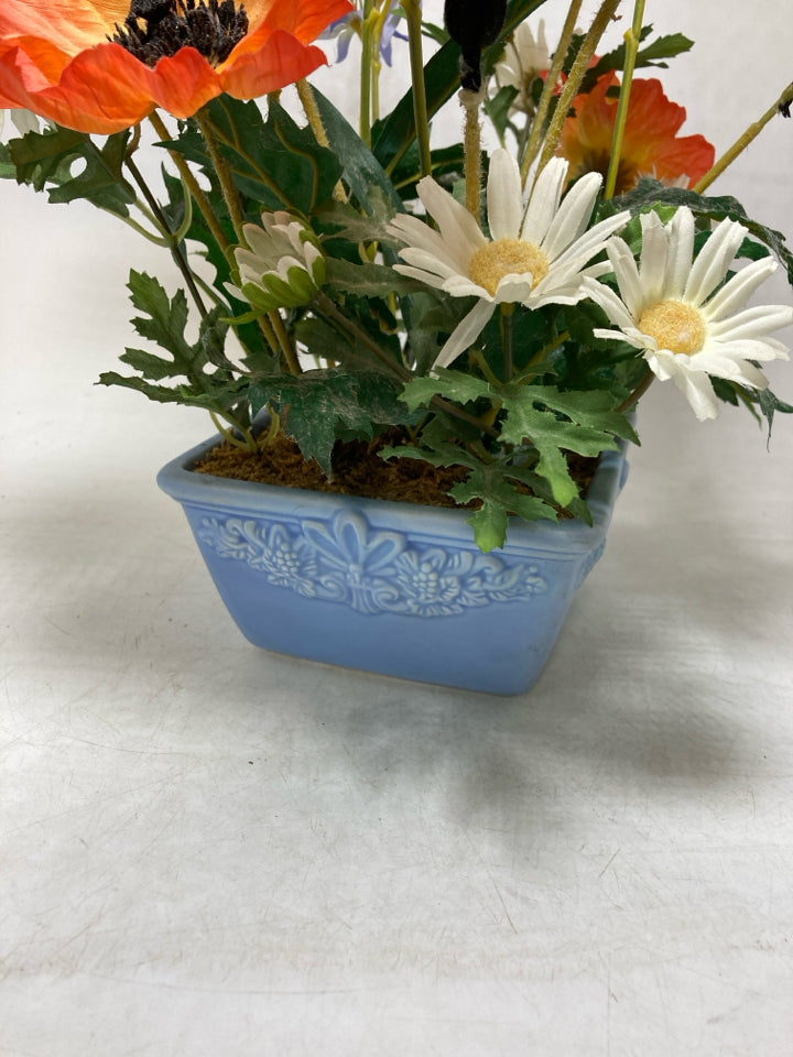 BLUE PLANTER W/ ASSORTED WILD FLOWERS.