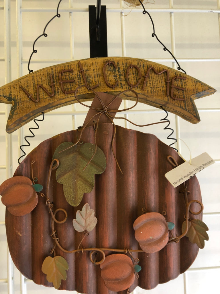 PRIMITIVE METAL PUMPKIN WELCOME SIGN.