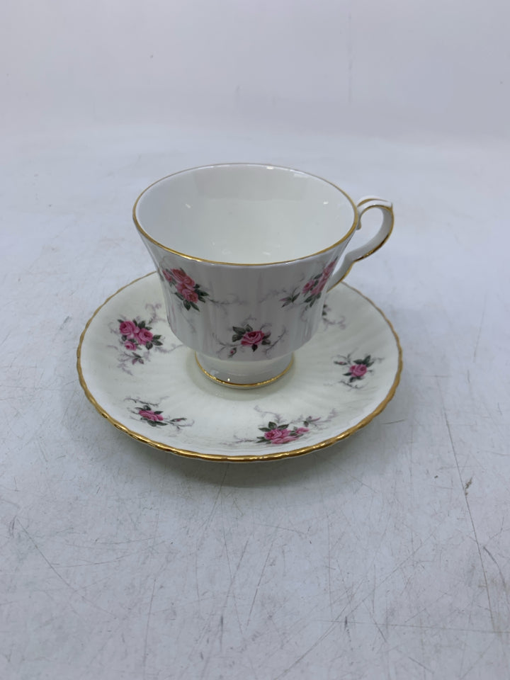 WHITE W/ PINK ROSES GOLD RIM.