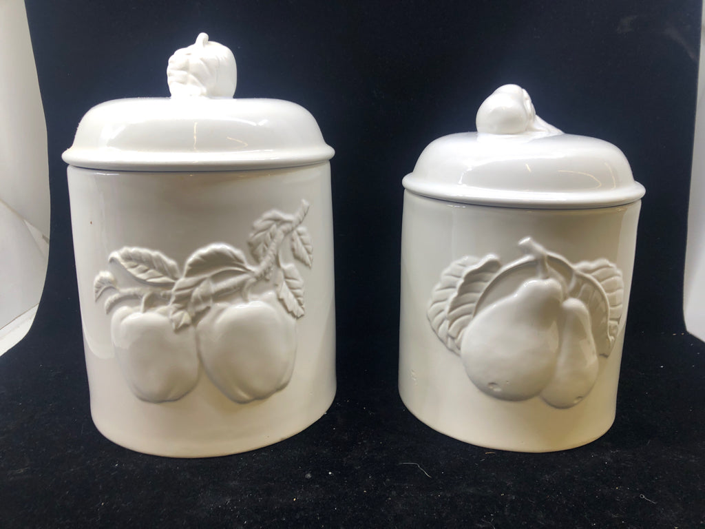 2 WHITE EMBOSSED APPLE CANISTERS.