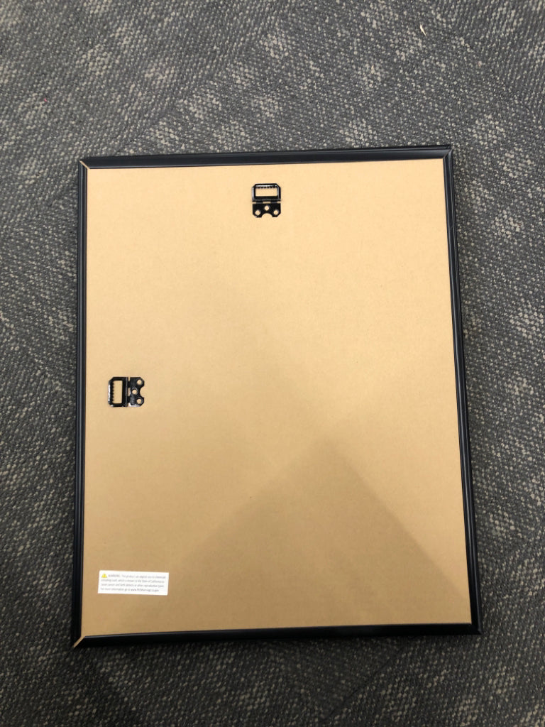 DEMON SLAYER PRINT IN BLACK FRAME.