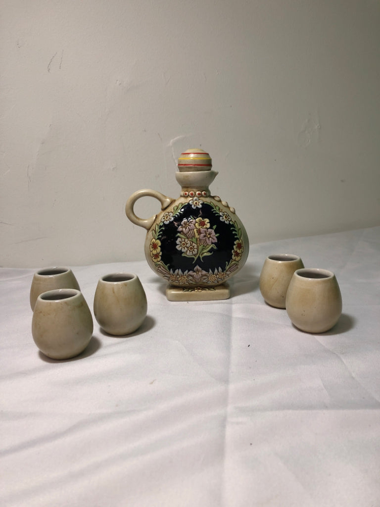 6PC SMALL GERMAN EMBOSSED PEOPLE GLASSES AND DECANTER.