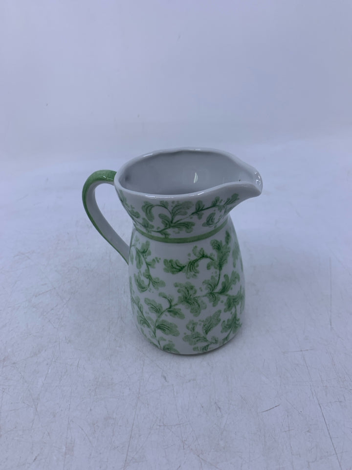 SMALL WHITE W/ GREEN STEMS/LEAVES PITCHER.