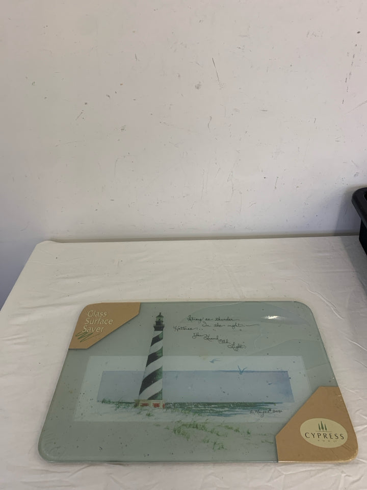 NIP LIGHTHOUSE GLASS CUTTING BOARD.