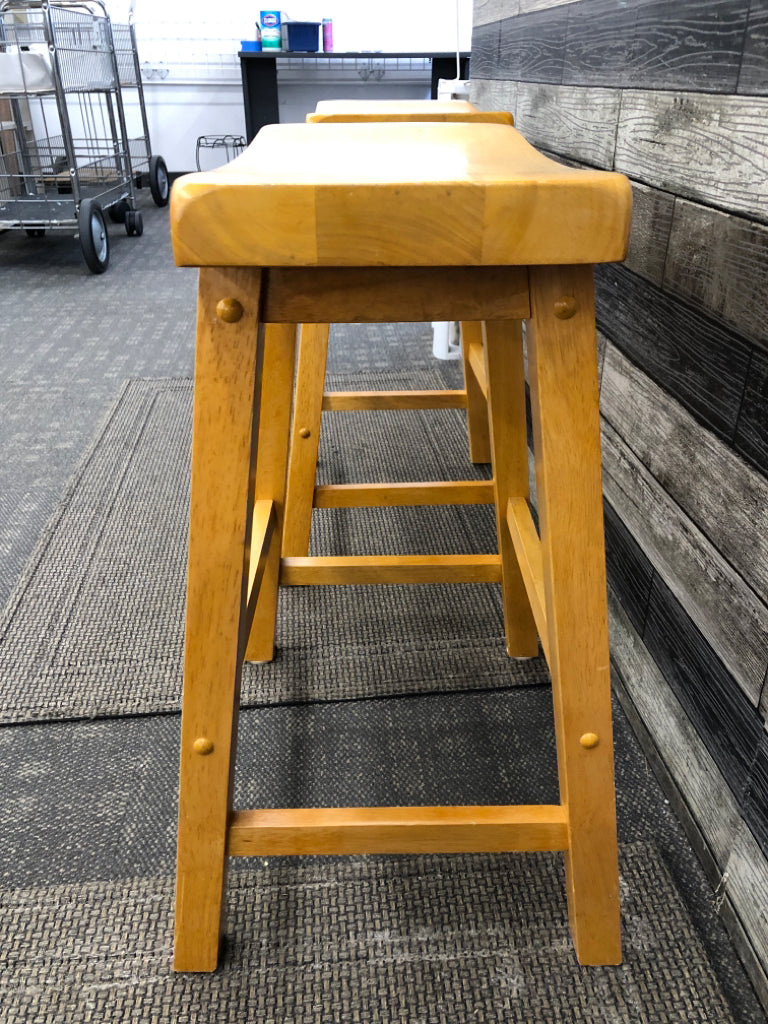 2 SHORT WOOD STOOLS.