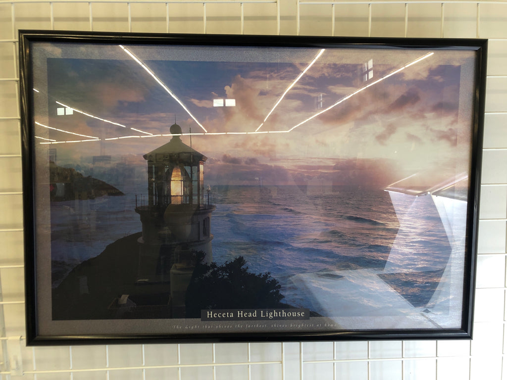 HECETA HEAD LIGHTHOUSE IN BLACK FRAME WALL ART.