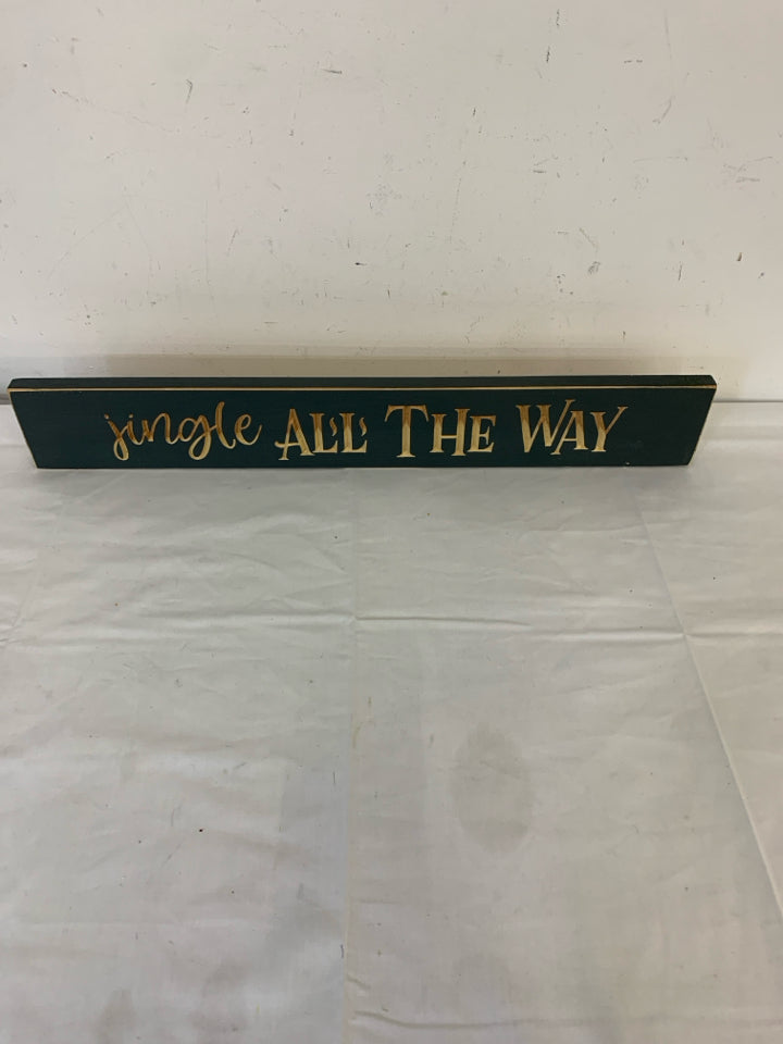 CARVED "JINGLE ALL THE WAY" DARK GREEN WALL ART.