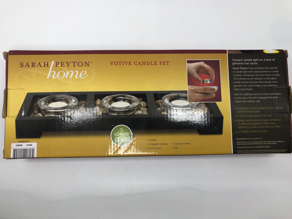 NIB VOTIVE CANDLE SET.