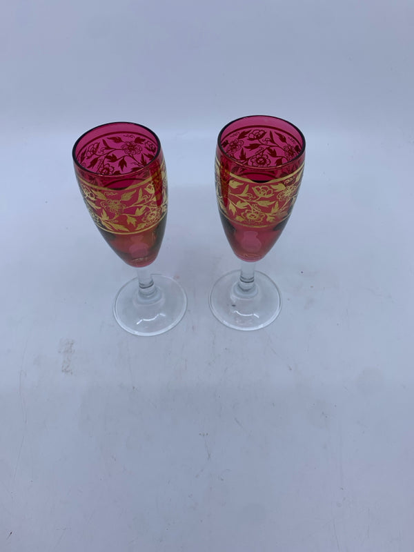 2 RED CHAMPAGNE FLUTES W/ GOLDEN FLOWER DESIGN MADE IN ITALY.