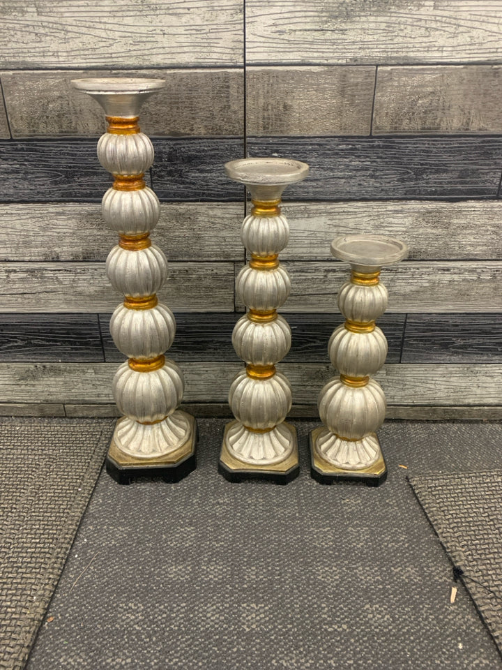 3 PC SILVER STACKING BALLS W/ GOLD DETAILS.