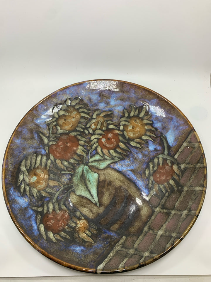 HEAVY BROWN GLAZED CERAMIC PLATE W/FLORAL BOUQUET DESIGN.