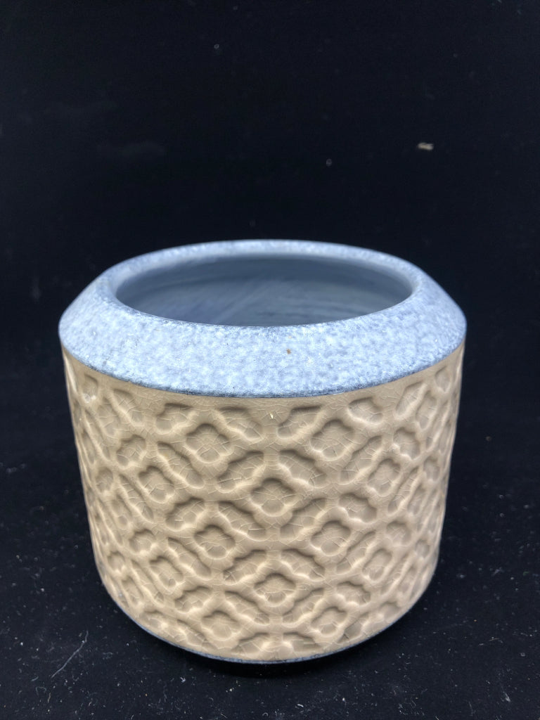 EMBOSSED BLUE AND TAN PLANTER.