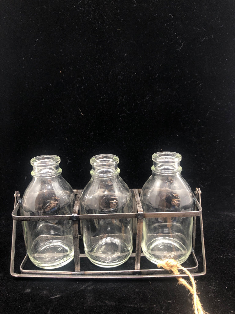 3 SM GLASS BOTTLES IN METAL CADDY.