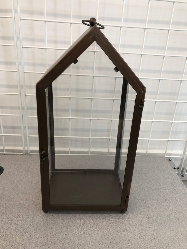 BRONZE PAINTED CANDLE LANTERN.