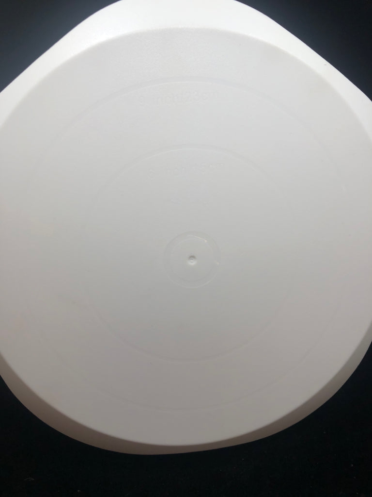 WHITE ROTATING CAKE-STAND.